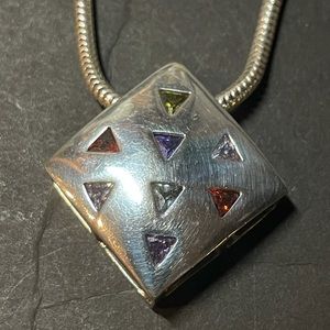 Diamond shape, multi colored semiprecious stones.